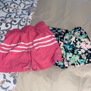 Abercrombie Kids Pink and Floral swim trunks